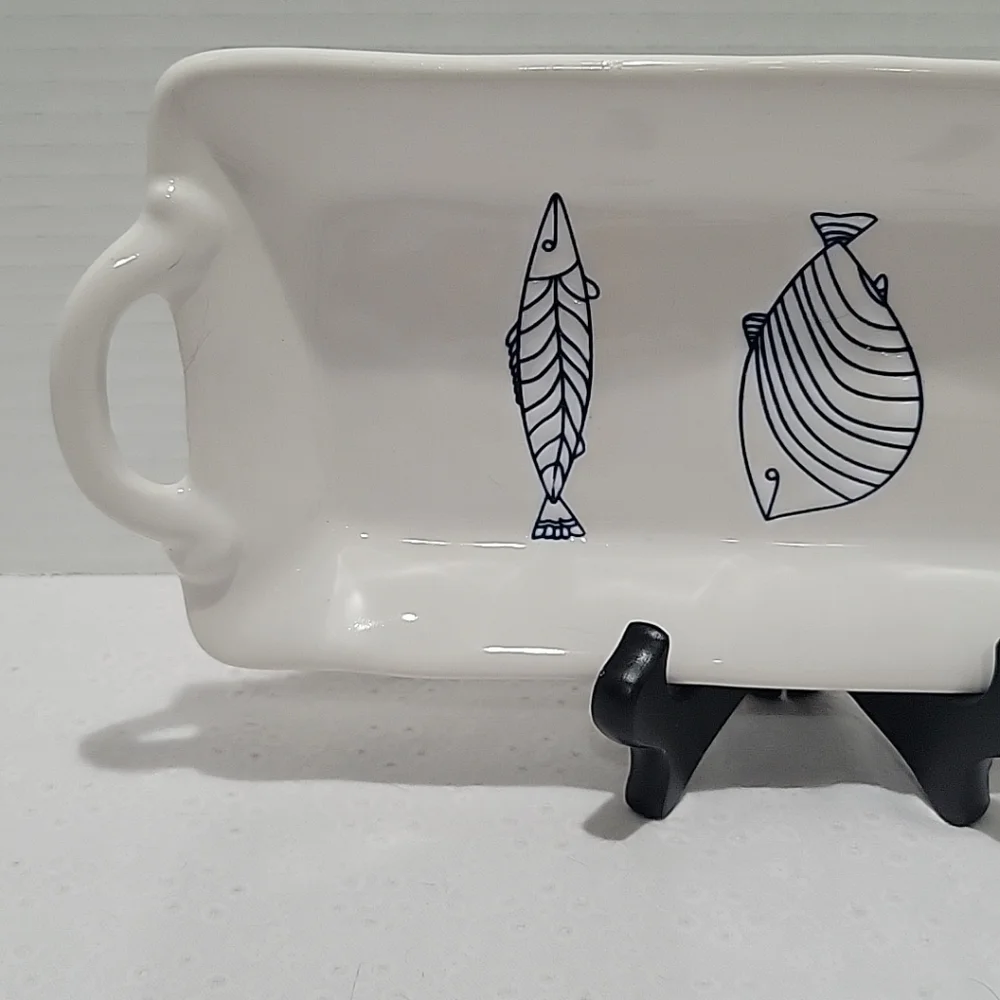 Pier 1 blue and white stonewear with various fish designs Hors d Deuvres